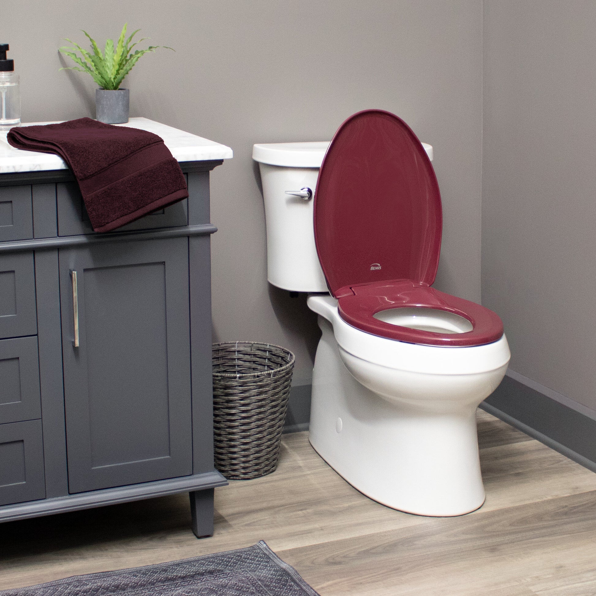 Bemis 1200SLOWT Classic Colors® Elongated Plastic Toilet Seat Featuring Stay·Tite® Seat Fastening System™, Whisper·Close®, and Easy·Clean® - Loganberry