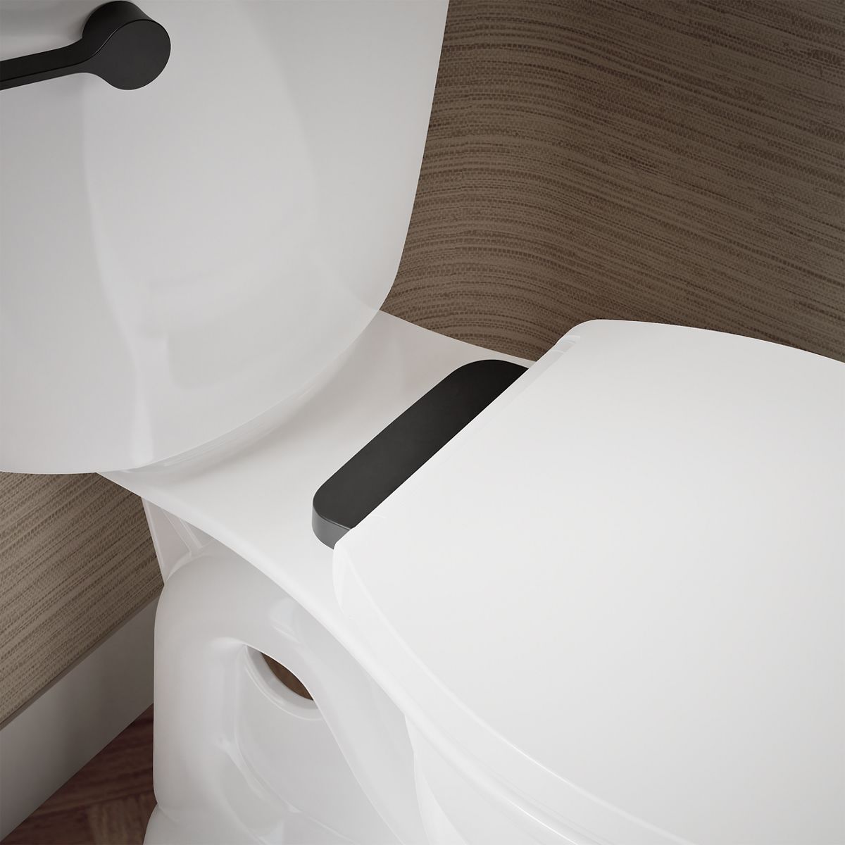 KOHLER K-27331-BL Glissade ReadyLatch® Quiet-Close™ Elongated Toilet Seat, White - Shows close up detail of product in room