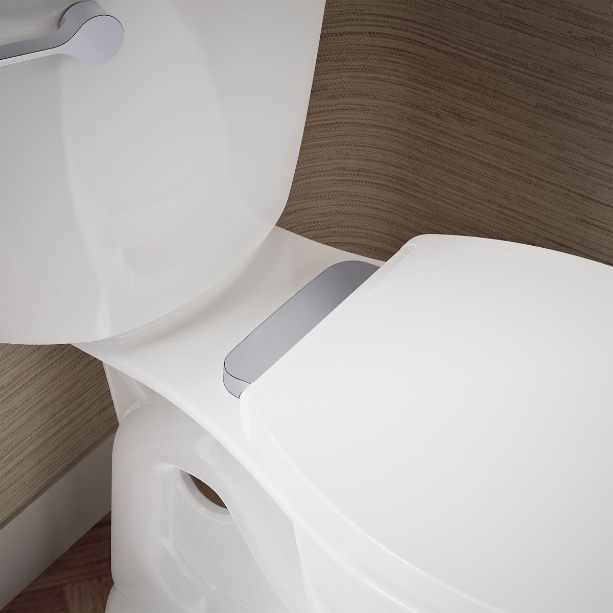 KOHLER K-27332-CP Glissade ReadyLatch® Quiet-Close™ Round-front Toilet Seat, White - Shows close up detail of product in room
