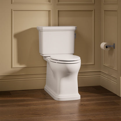 KOHLER K-39678-RA Claude Two-piece Elongated Toilet with Skirted Trapway, 1.6 GPF, White - image focused on single product st