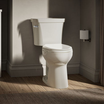 KOHLER K-43949 Highline Two-piece Elongated Toilet, 1.28 GPF, Biscuit - image focused on single product story