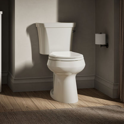 KOHLER K-5481-RA Highline ComForteeight Two-piece round-front 1.28 gpf chair height toilet with right-hand trip lever - Biscuit