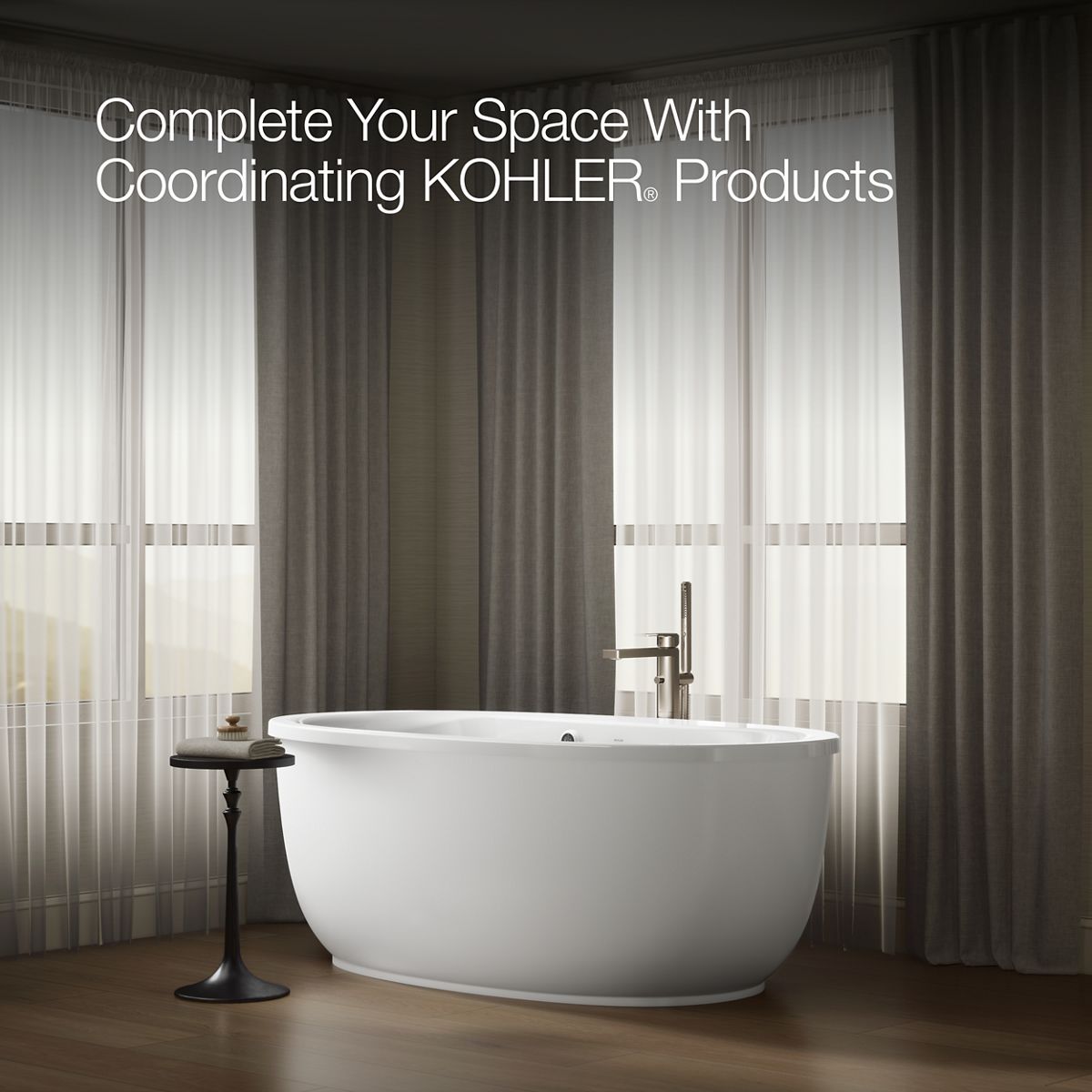 KOHLER K-6369-W1 Sunstruck 65-1/2" x 35-1/2" oval freestanding bath with Bask heated surface and fluted shroud